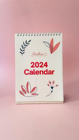 2024 calendar printed on deluxe textured pqperتقويم مكتبي ٢٠٢٤ ميلادي ومايقابله بالهجري مطبوع على ورق مقمش فاخر