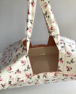 صورة حقيبة بطراز ريفي لحمل صينية الحلا او حافظة الطعام 