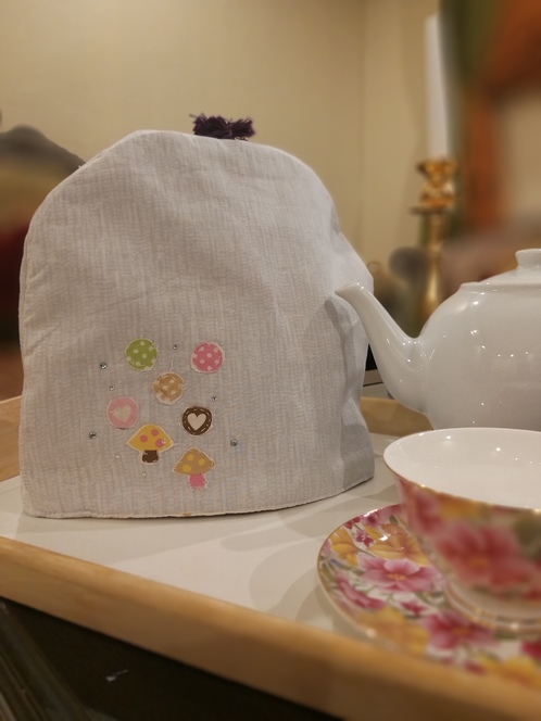 Tea cozy غطاء للشاي لحفظ الحراره